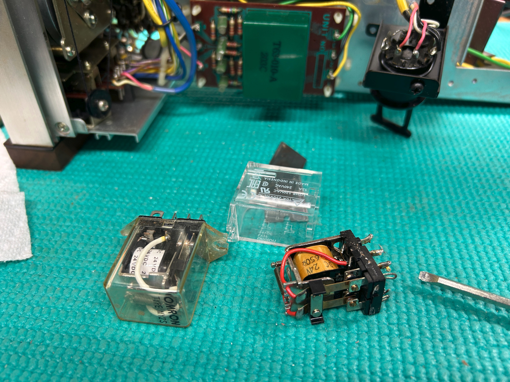 Original Pioneer relay, opened relay mechanism and modern replacement used during the SX-828 protection rebuild